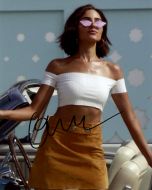 Olivia Culpo - (Earn 5 reward points on this item worth $1.25)